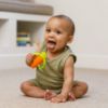 Picture of Infantino Lil' Nibbles Textured Silicone Baby Teether - Sensory Exploration and Teething Relief with Easy to Hold Handles, Orange Carrot, 0+ Months