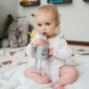 Picture of Dr. Brown's Milestones Narrow Sippy Straw Bottle, Spill-Proof with 100% Silicone Handles and Weighted Straw, 8 oz/250 mL, Gray, 6m+