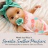 Picture of Itzy Ritzy Silicone Pacifiers for Newborn - Sweetie Soother Pacifiers Feature Collapsible Handle & Two Air Holes for Added Safety; for Ages Newborn and Up, Set of 2 in Aquamarine & Peach