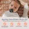 Picture of Itzy Ritzy Natural Rubber Pacifiers Set of 2 - Natural Rubber Newborn Pacifiers with Cherry-Shaped Nipple & Large Air Holes for Added Safety; Set of 2 in Camo & Midnight, Ages 0 - 6 Months