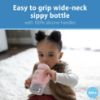 Picture of Dr. Brown's Milestones Wide-Neck Sippy Spout Bottle with 100% Silicone Handles, Easy-Grip Handles with Soft Sippy Spout, 9oz/270mL, Light-Pink, 1-Pack, 6m+