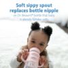 Picture of Dr. Brown's Milestones Wide-Neck Sippy Spout Bottle with 100% Silicone Handles, Easy-Grip Handles with Soft Sippy Spout, 9oz/270mL, Light-Pink, 1-Pack, 6m+