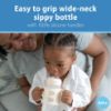 Picture of Dr. Brown's Milestones Wide-Neck Sippy Spout Bottle with 100% Silicone Handles, Easy-Grip Handles with Soft Sippy Spout, 9oz/270mL, Ecru, 1-Pack, 6m+