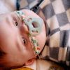 Picture of Tommee Tippee Ultra-Light Silicone Pacifier, 0-6 Months, Symmetrical One-Piece Design, BPA-Free Silicone Binkies, Clear/Green/Pink, Pack of 4