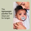 Picture of Tommee Tippee Ultra-Light Silicone Pacifier, 0-6 Months, Symmetrical One-Piece Design, BPA-Free Silicone Binkies, Blue/Green/Clear, Pack of 4