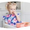 Picture of Tiny Twinkle Mess Proof Baby Bib - Waterproof & Lightweight Baby-Led Weaning Apron | 100% Recycled Polyester, Easy Clean & Machine Washable (Floral Blue, Small 6-24 Months)