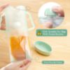 Picture of Momcozy Squeeze Pouch Holder for Food Pouches and Drink Boxes, Baby Pouch Holder Allows Baby to Self-Feed and Avoid Messes, Baby Food Pouch Holder Handle is Easy to Grip, Comfortable, Green