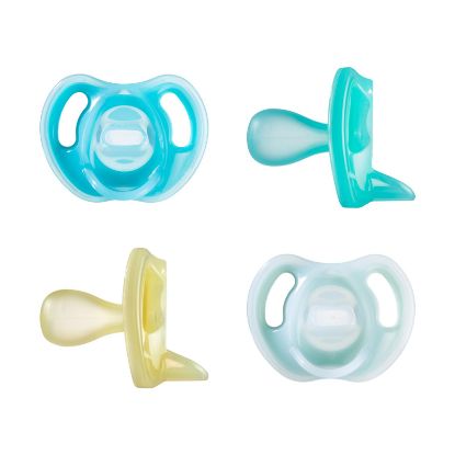 Picture of Tommee Tippee Ultra-Light Silicone Pacifier, 6-18 Months, Symmetrical One-Piece Design, BPA-Free Silicone Binkies, Blue/Green/Yellow, Pack of 4