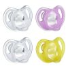 Picture of Tommee Tippee Ultra-Light Silicone Pacifier, 6-18 Months, Symmetrical One-Piece Design, BPA-Free Silicone Binkies, Clear/Pink/Yellow, Pack of 4