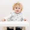 Picture of Tiny Twinkle Mess Proof Baby Bib - Waterproof & Lightweight Baby-Led Weaning Apron | 100% Recycled Polyester, Easy Clean & Machine Washable (Dinosaur,Large 2-4 Years)