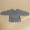 Picture of mushie Long Sleeve Baby Bib | Mess Free & Waterproof Fabric for Toddlers | Adjustable Fit for Ages 6-24 Months (Tradewinds)