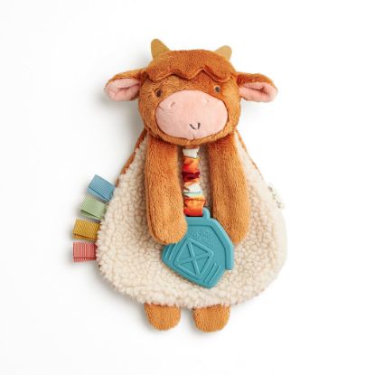 Picture of Itzy Ritzy - Itzy Lovey Including Teether - Baby Lovey with Teether, Textured Ribbons & Dangle Arms - Features Crinkle Sound, Sherpa Fabric and Minky Plush (Highland Cow)