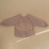 Picture of mushie Long Sleeve Baby Bib | Mess Free & Waterproof Fabric for Toddlers | Adjustable Fit for Ages 6-24 Months (Blush)