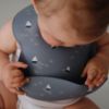Picture of mushie Silicone Baby Bib | Adjustable Fit Waterproof Bibs (Boats)