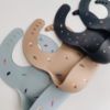 Picture of mushie Silicone Baby Bib | Adjustable Fit Waterproof Bibs (Retro Cars)