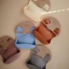 Picture of mushie Silicone Baby Bib | Adjustable Fit Waterproof Bibs (Woodchuck)