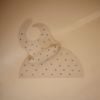 Picture of mushie Silicone Baby Bib | Adjustable Fit Waterproof Bibs (Black Daisy)