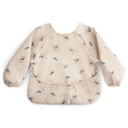 Picture of mushie Long Sleeve Baby Bib | Mess Free & Waterproof Fabric for Toddlers | Adjustable Fit for Ages 6-24 Months (Whales)