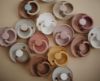 Picture of FRIGG Daisy Natural Rubber Baby Pacifier | Made in Denmark | BPA-Free (Baked Clay/Cream, 0-6 Months) 2-Pack