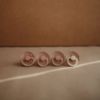 Picture of FRIGG Daisy Night Natural Rubber Baby Pacifier | Made in Denmark | BPA-Free (Blush/Cream, 0-6 Months) 2-Pack