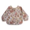Picture of mushie Long Sleeve Baby Bib | Mess Free & Waterproof Fabric for Toddlers | Adjustable Fit for Ages 6-24 Months (Retro Flowers)