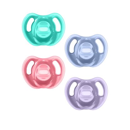 Picture of Tommee Tippee Ultra-Light Silicone Pacifier, 18-36 Months, Symmetrical One-Piece Design, BPA-Free Silicone Binkies, Pink/Violet/Green, Pack of 4