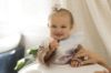 Picture of Tiny Twinkle Mess Proof Baby Bib - Waterproof & Lightweight Baby-Led Weaning Apron | 100% Recycled Polyester, Easy Clean & Machine Washable (Cotton Candy, Small 6-24 Months)
