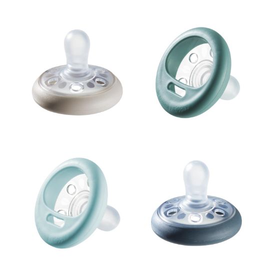 Picture of Tommee Tippee Breast-Like Night Pacifier, 6-18 Months, 4 Pack, Glow in The Dark Paci, Breast-Shaped Nipple for a Natural Latch, BPA-Free