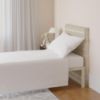 Picture of Amazon Basics 3 Piece Bed Sheets Set, 100% Cotton Jersey, Includes Super Soft, Flat and Fitted Sheets, Pillowcase, Toddler, White, Solid