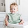 Picture of Tiny Twinkle Mess-Proof Baby Bib - Waterproof Bib for Baby Boy or Girl - Machine Washable - Adjustable Closure - PVC, BPA, & Phthalate Free - Great for Travel - Baby Food Bibs (3 Pack, Cowboy)