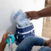 Picture of Bumkins Waterproof Wet Dry Clutch Bag for Baby, Travel, Swim Suit, Cloth Diapers, Pump Parts, Pool, Gym Clothes, Toiletry, Hook to Stroller, Pack for Daycare, Zip Bag, Packing Pouch, Evil Eye