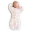 Picture of SwaddleDesigns Transitional Swaddle Sack, Arms Up Half-Length Sleeves & Mitten Cuffs, Swaddle for Newborn Transition to Baby Sleep Sack Wearable Blanket, 3-6 Month, 14-21 lb, Heavenly Floral Pink