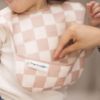 Picture of Tiny Twinkle Mess-Proof Baby Bib - Waterproof Bib for Baby Girl - Machine Washable - Adjustable Closure - PFAS, PVC, BPA, Phthalate Free - Baby Food Bibs (3 Pack, Checkers Girl)
