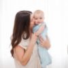 Picture of Happiest Baby Sleepea 5-Second Swaddle - 100% Organic Cotton Baby Swaddle Blanket - Doctor Designed Promotes Healthy Hip Development (Teal Stars, Medium)