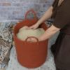 Picture of XUANGUO Cotton Rope Laundry Basket Hamper for Clothes Woven Storage Basket for Living Room Bedroom Boho Tall Rope Baskets for Blanket Toys Pillow Towels Baby Nursery Hamper Bin Large rust red