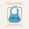 Picture of Numnum Silicone Bib for Babies & Toddlers | Waterproof, Soft, BPA Free 100% Food Grade Silicone | Self Feeding, Adjustable Fit, Unisex (2 Bibs & 2 Spoons)