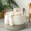 Picture of KAKAMAY Large Blanket Basket (20"x13"),Woven Baskets for storage Baby Laundry Hamper,Cotton Rope Blanket Basket for Living Room, Laundry, Nursery, Pillows, Baby Toy chest (White/Beige)