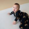 Picture of KYTE BABY Unisex Rayon Made From Bamboo Sleep Bag for Babies and Toddlers, 1.0 Tog (Large, Rust Rainbow on Midnight)