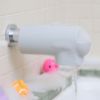 Picture of Munchkin Soft Spot Bath Spout Cover for Baby, Bathtub Guard with Built-in Bubble Bath Dispenser, Silicone, Grey