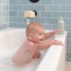 Picture of mushie Bath Spout Cover | Soft Silicone Bathtub Faucet Safety Guard for Kids | Universal Fit (Shifting Sand)