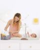 Picture of Skip Hop Baby Changing Pad Nursery Style Wipe-Clean Contoured with Cushioned Foam, Non-Skid Base, Built-in Safety Belt & Tuck-Away Toy Bar Fits Standard Changing Tables, Oat