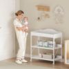 Picture of Yetom Baby Changing Table, Diaper Changing Station with Pad and Wheels, Two-Tier Open Storage Shelves, Waterproof Diaper pad & Safety Strap, Compact Baby Furniture for Nursery, White