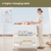 Picture of Yetom Baby Changing Table, Diaper Changing Station with Pad and Wheels, Two-Tier Open Storage Shelves, Waterproof Diaper pad & Safety Strap, Compact Baby Furniture for Nursery, White