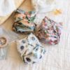 Picture of Esembly Cloth Diaper Cover - Reusable Swim Diaper, Waterproof, Breathable - Adjustable Outer Layer Over Absorbent Inner for Blowout Protection - Botanic Garden, Size 1 (7-17lbs)