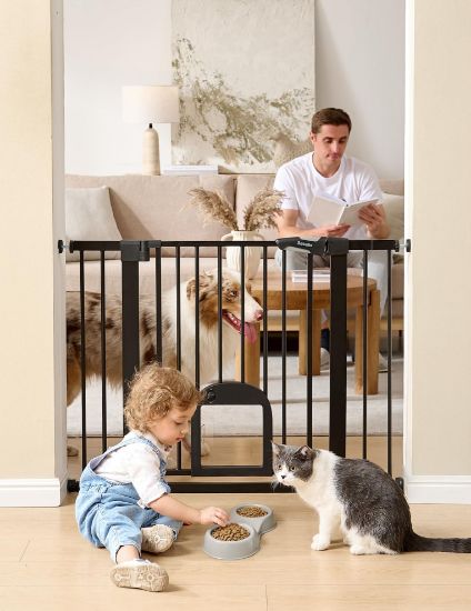 Picture of Babelio Upgraded Baby Gate with Cat Door, 29-43" Auto Close Durable Dog Gate for Stairs, Doorways and House, Easy Walk Thru Safety Gate with Pet Door Includes 4 Wall Cups, Black