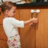 Picture of Child Safety Strap Locks (10 Pack) Baby Locks for Cabinets and Drawers, Toilet, Fridge & More. 3M Adhesive Pads. Easy Installation, No Drilling Required, White