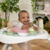 Picture of Ingenuity Spring & Sprout 2-in-1 Baby Activity Center Jumper and Table with Infant Toys - Ages 6 Months +, First Forest in Pink