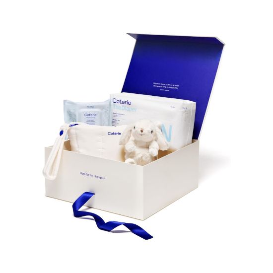 Picture of Coterie The Newborn Gift Set, Size Newborn Diapers (31 Count) & Size 1 (33 Count), 1 Travel Size Pack Baby Wipes (18 Count), Plant Based Materials, Hypoallergenic for Sensitive Skin, Baby Essentials