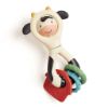 Picture of Itzy Ritzy Spinner Rattle Toy - Cow Design Sensory Teething Rattle Includes Spinning Face, Clicks, Rattles & Textured Teethers - Designed for Ages 3 Months and Up (Cow)